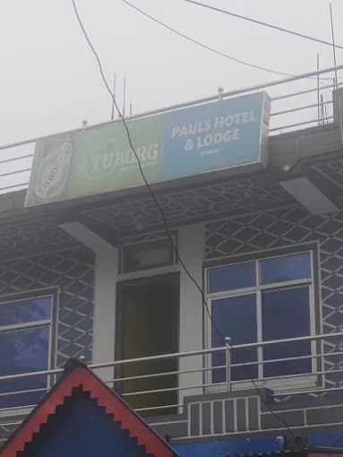 Paul's Hotel and Lodge signboard