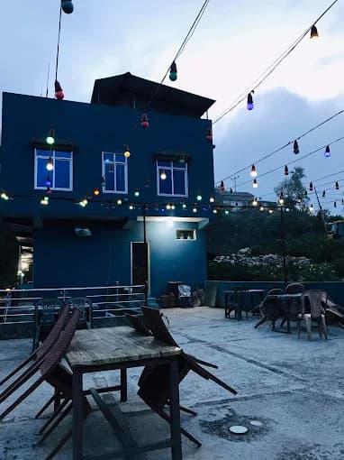 Terrace at Paul's Hotel lit with string lights